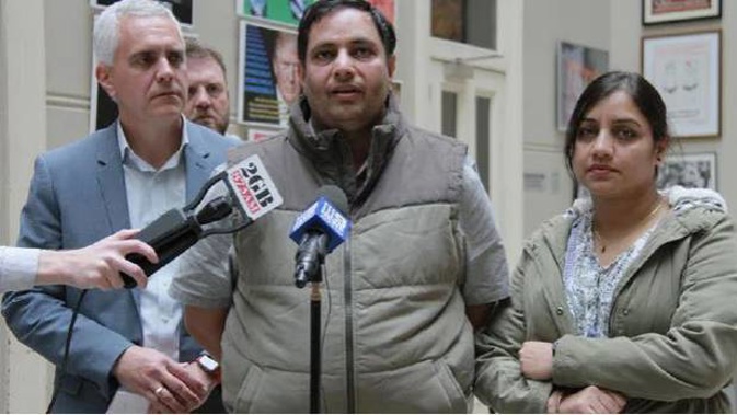 TWU national secretary Michael Kaine with Adelaide couple Santosh and Amita Gupta, who say they were underpaid and unfairly sacked by Uber. (Photo / Supplied)