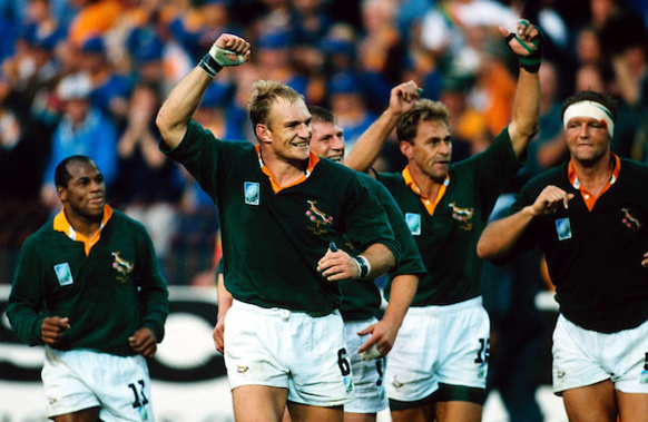 Francois Pienaar and team celeberate after the rugby World Cup final between South Africa and the All Blacks, 24 June 1995. (Photo: PHOTOSPORT)