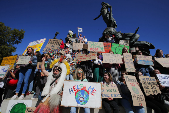 Youths gather for the Global Climate Strike at Nation square in Paris. (Photo / AP)