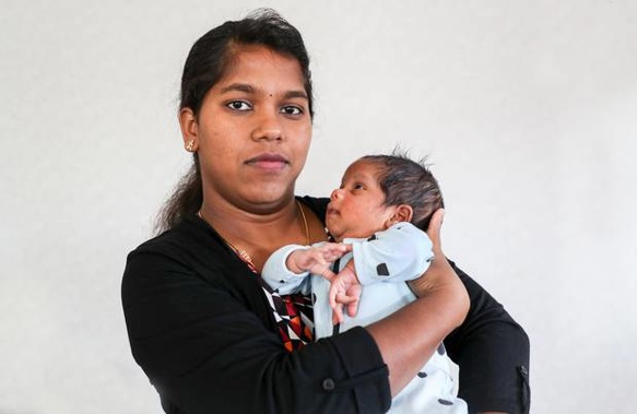 Kasthuri Dhamodharan and baby Mithun Aarish Dhamodharan at home in Napier after a traumatic complication during childbirth. (Photo / Warren Buckland)
