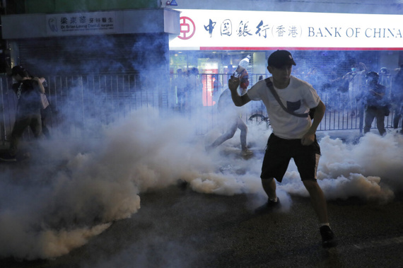 ear fas fills the street as protesters continue to battle with police on the streets of Hong Kong. (Photo / AP)