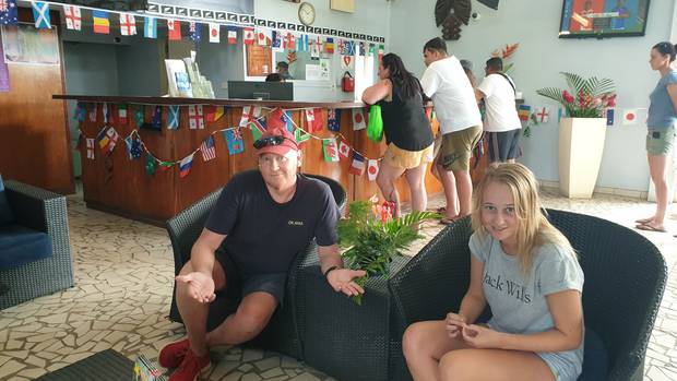 Brenton Barker, 57, with his daughter Georgia Wilson, 20, stuck in Edgewater Hotel after Jetstar cancelled their flight to Auckland. (Photo / Supplied)