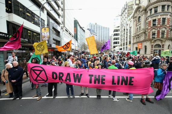 Protesters block Lambton Quay during an Extinction Rebellion protest in Wellington. Photo / Getty Images
