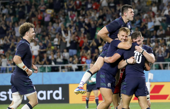 Scotland players celebrate. (Photo / AP)