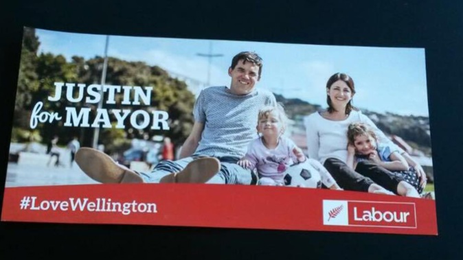 The campaign ad with Justin Lester and his family sitting above the Labour Party logo. Photo / Supplied