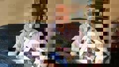 Robert Love holds a picture of his late mother who suffered from failings during her care in a rest home. (Photo / John Borren)