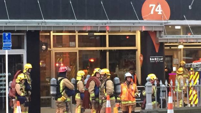 Firefighters outside the Barclay Suites on Albert St in Auckland's CBD. (Photo / Cherie Howie)
