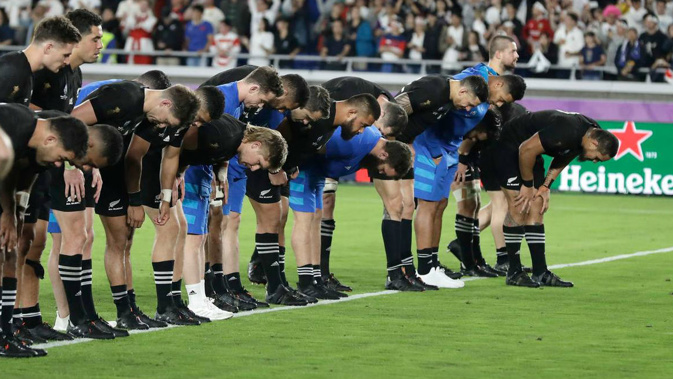 The All Blacks bow to the crowd after the Rugby World Cup semifinal. (Photo / AP)