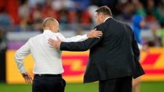 England coach Eddie Jones and All Blacks coach Steve Hansen greet each other before the semifinal. (Photo / AP)