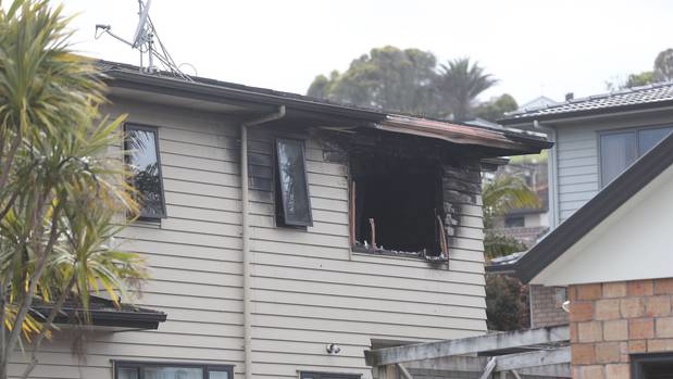 The damage to the upper storey of the house where one person died. Photos / Jason Oxenham