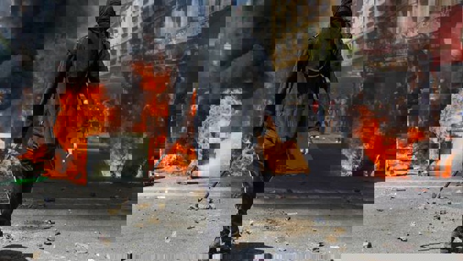 Days of anti-government protests have prompted Chile's Government to cancel major upcoming international events. (Photo / AP)
