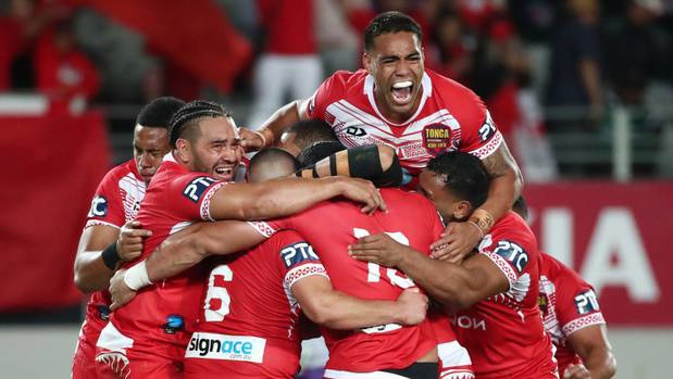 Tonga celebrate their win over Australia. (Photo / Getty)
