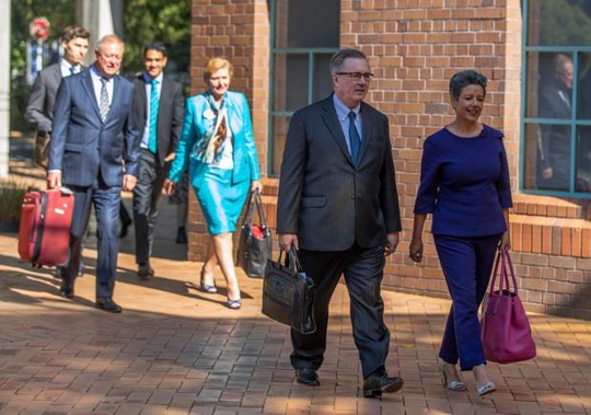 National Party politicians Paula Bennett, right, and Anne Tolley, centre, arrive at the High Court in Auckland. (Photo / NZ Herald)