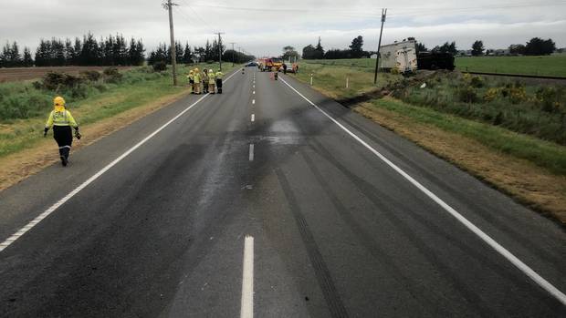 Emergency services at the scene of a serious crash involving a truck and other vehicles on State highway 1. (Photo / Bridget Shimmin)