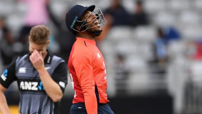 Chris Jordan and Jimmy Neesham react after the game goes to a Super Over. Photo / Getty