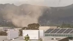 A tornado has injured one person and blown out windows in Christchurch. (Photo / YouTube)