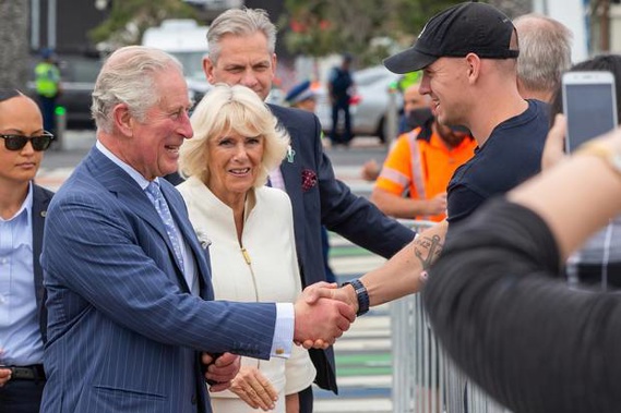 Prince Charles and Camilla take part in a public walk in Auckland. (Photo / Pool)