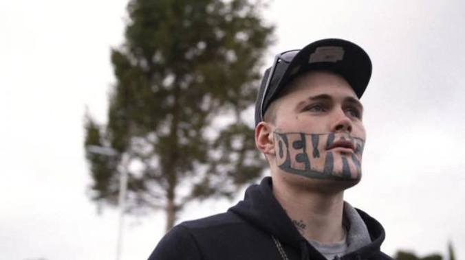 Mark Cropp is better known as Devast8, a nickname inked onto his face in a tattoo that stretches from ear to ear. (Photo / Supplied)