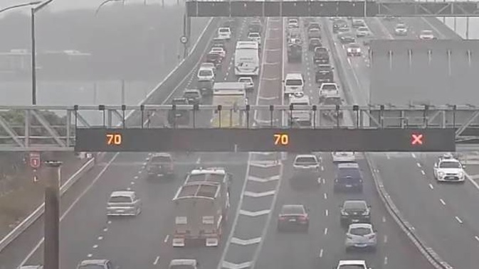 Motorists are being warned to drive with extra care as strong winds buffet Auckland's Harbour Bridge. Photo / NZTA