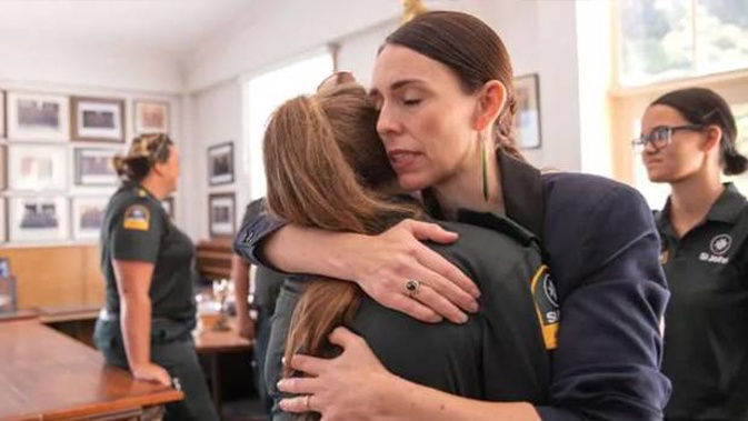 New Zealand Prime Minister Jacinda Ardern meets with first responders at the Whakatane Fire Station. Photo / Getty Images