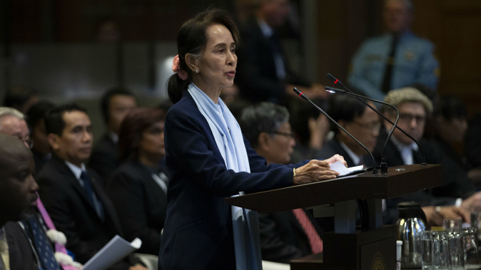 Myanmar's leader Aung San Suu Kyi addresses judges of the International Court of Justice for the second day of three days of hearings in The Hague. (Photo / AP)