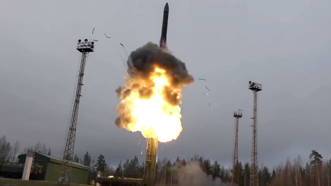 In this photo taken from undated footage distributed by Russian Defense Ministry Press Service, an intercontinental ballistic missile lifts off from a truck-mounted launcher somewhere in Russia. (Photo / via AP)