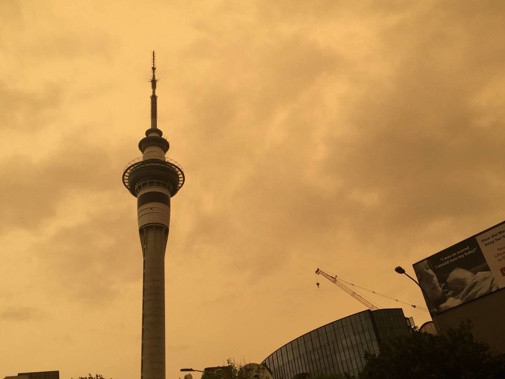 The sky above the Sky Tower in Auckland on Sunday afternoon. Photo / Luke Kirkness