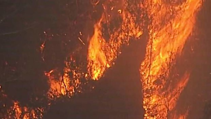 A mega-blaze has formed at the Snowy Mountains on the border of NSW and Victoria. Photo / AP