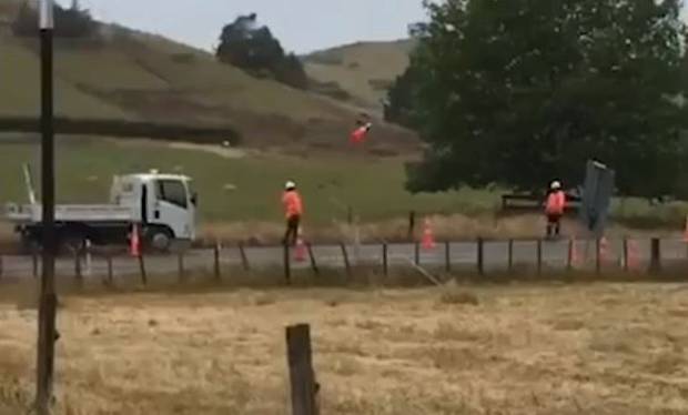 Video captures roadworkers having some down time near Waihī. Video / Jason Jujnovich