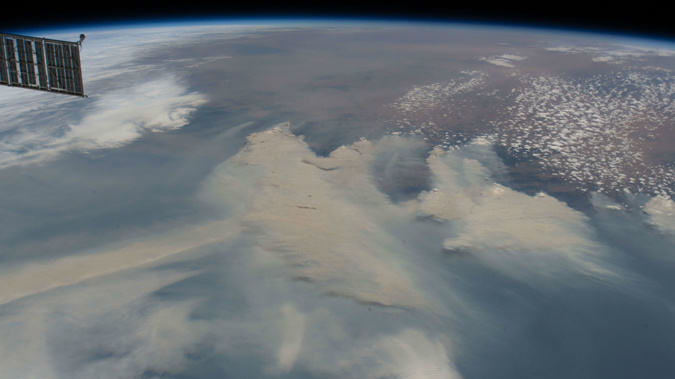 Smoke from bushfires blankets the southeast coastline of Australia on January 4, 2020, as the International Space Station orbited 269 miles above the above the Tasman Sea. The smoke is expected to make at least one "full circuit" around the globe and return to the skies over the country, scientists from NASA have warned.
