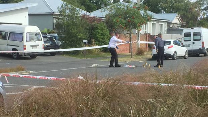 Police at the scene in Forbes St, Sydenham. Photo / Amber Allott