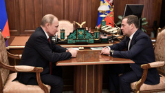 Russian President Vladimir Putin meets with Prime Minister Dmitry Medvedev in Moscow on January 15. (Photo / Getty)