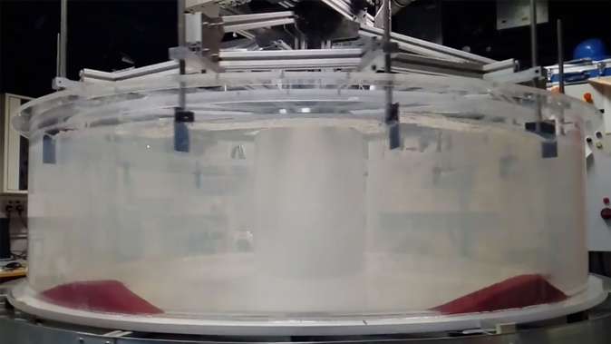 Scientists at Cambridge University tested the movement of sand dunes in a large rotating water tank.