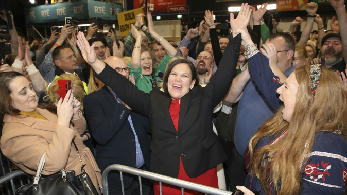 Sinn Fein leader Mary Lou McDonald celebrates with supporters after topping the poll. (Photo / AP)