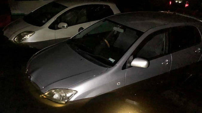 The carpark at the convention centre was flooded as a result of the fire-fighting effort. (Photo / NZ Herald)