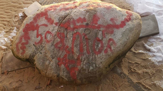 Plymouth Rock and other historic landmarks were vandalized with graffiti.
