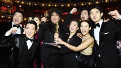 Cast and crew of "Parasite" at the Oscars after their Best Picture win. (Photo / Getty)