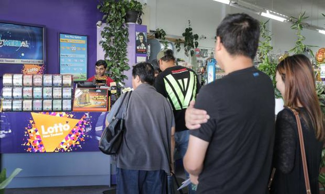 People queuing to buy Lotto tickets ahead of yesterday's $42m Powerball draw. (Photo / Michael Craig)