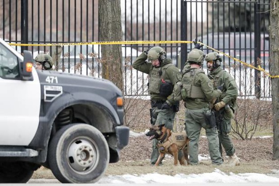 Police work outside the Molson Coors Brewing Co. campus in Milwaukee. Photo / AP
