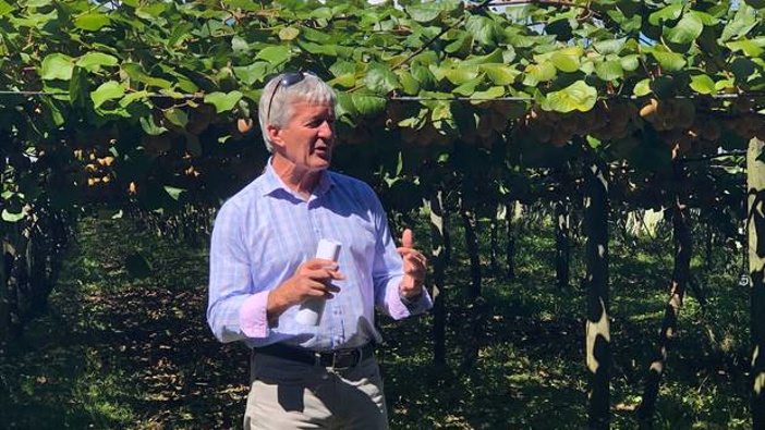 Food safety Minister Damien O'Connor on an organic Kiwi orchard in Opotiki announcing that the Organic Products Bill has been introduced into Parlianent. (Photo / Supplied)
