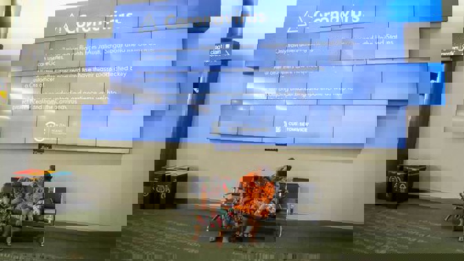 Travellers passing through New Zealand airports are being advised how to contain the virus. (Photo / Jason Oxenham)