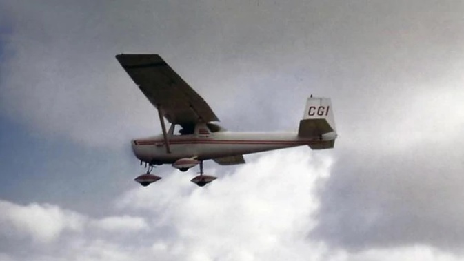 The Cessna 150 ZK-CGI, piloted by new owner Steven Elliott, in flight in 1985. Photo / ODT