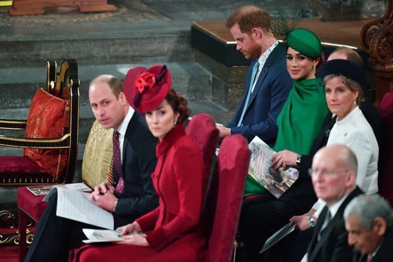 Harry and Meghan sit behind William and Kate at the service. Photo / AP