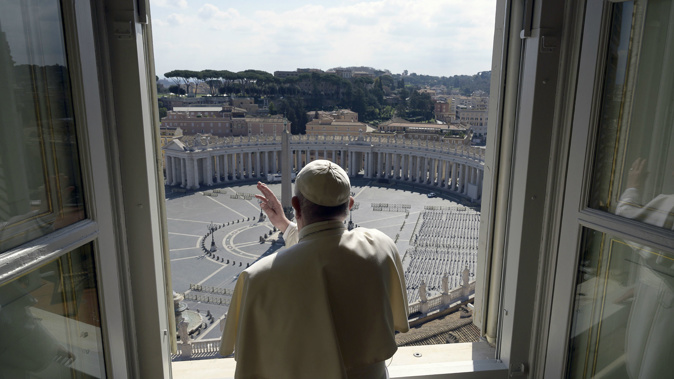 Pope Francis delivers his blessing from inside the Apostolic library at the Vatican, Sunday, March 15, 2020. (Photo / Vatican News via AP)