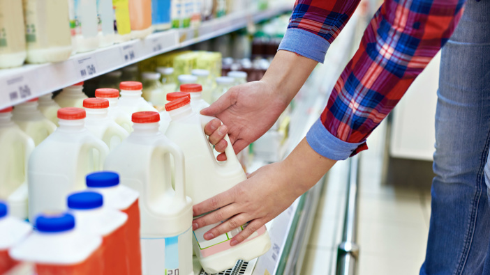 Dairies and supermarkets are considered essentuial services. (Photo / Getty)
