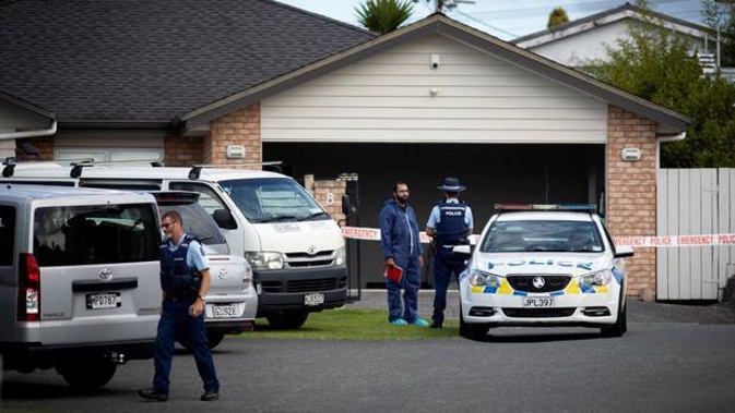 Police yesterday searched a West Auckland property linked to a man whose remains were found buried off the Desert Rd. Photo / Dean Purcell