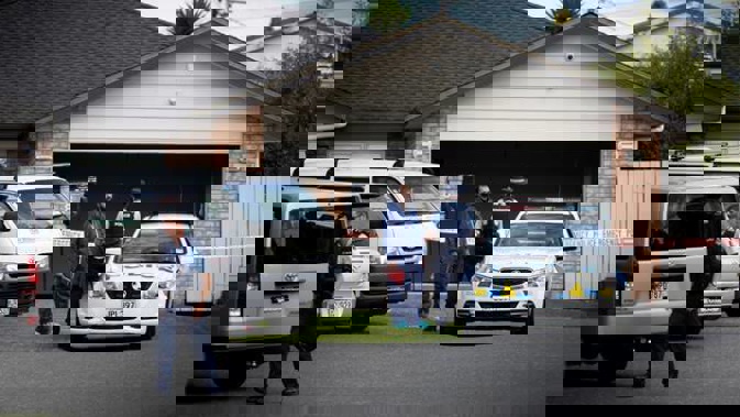 Police yesterday searched a West Auckland property linked to a man whose remains were found buried off the Desert Rd. Photo / Dean Purcell