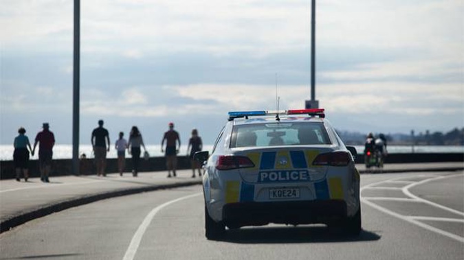 Police patrol Auckland's Tamaki Drive on day 10 of the lockdown. Photo / Sylvie Whinray