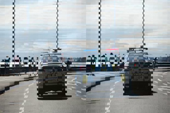 Police patrolling Tamaki Drive in Auckland during the lockdown. (Photo / NZ Herald)