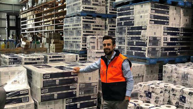 NXP executive Joe Taylor with the first of five shipments of personal protective equipment (PPE) coming from China for essential workers to use during the Covid-19 crisis. (Photo / Supplied)